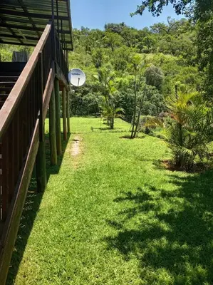 a white frisbee flying over a grass field at Barberton Troop Cabin in Barberton