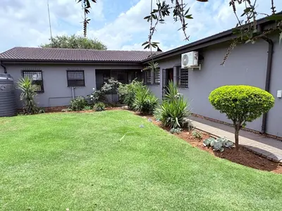 a house with a lawn in front of it at 43 Home Reyno Ridge in Witbank