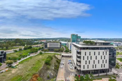 an aerial view of a city with buildings at Menlyn Main Apartments Trilogy Collection in Pretoria