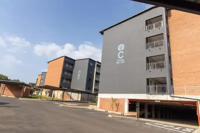 an empty street in front of a building at LSG Delta in Centurion