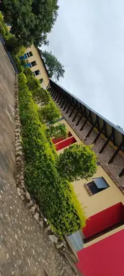 a building with green plants on the side of it at MoyMoy Lifestyle Lodge in Meetse-a-Bophelo