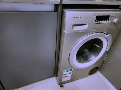a washer and dryer in a small room at Cozy Corner in Midrand