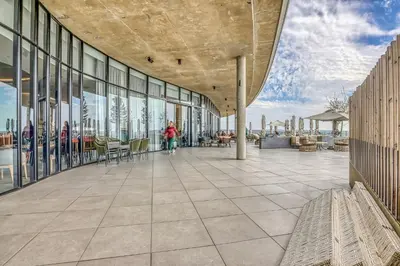 a rendering of a building with a patio with tables and chairs at Nova Luxe Midrand Waterfall Ellipse Galileo in Midrand