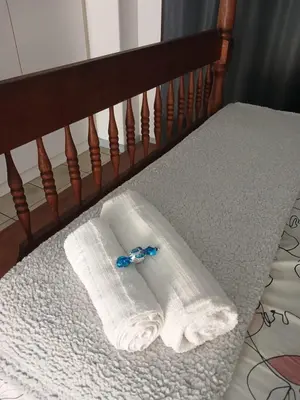 a towel sitting on a crib with a towel at 899 On Burlington in Pretoria