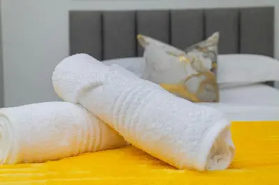a peeled banana sitting on top of a table at Golden Sun Suites in Midrand