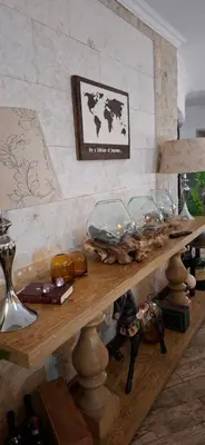 a wooden table with some items on top of it at Green Haven Guest Lodge in Pretoria