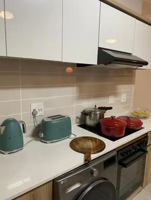 a kitchen with a stove with pots and pans at Blyde Lagoon View Facing Crystal 2 Large Bedrooms in Pretoria