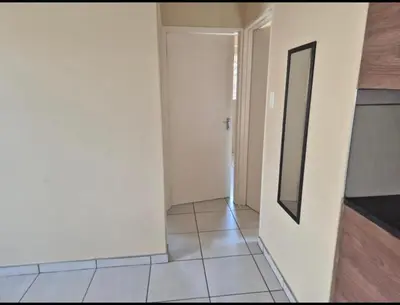 an empty room with a door and a tile floor at River luxury home in Chartwell