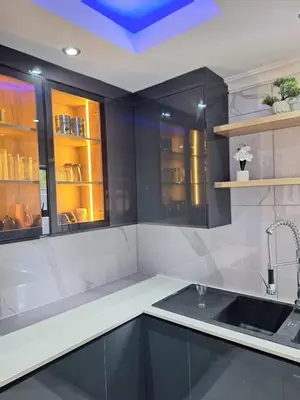 a kitchen with a sink and a counter at Sunrise Lodge in Phalaborwa