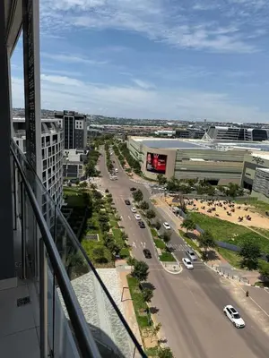 a view of a city street with cars on the road at Ellipse Luxary Apartment in Midrand
