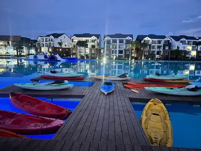 a group of boats on a dock in the water at The Exquisite apartment at its best ! in Pretoria