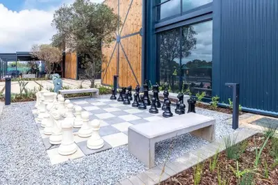 a chess board with a giant chess board at Lagoon Aparthotel in Pretoria