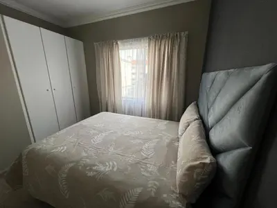a bedroom with a bed and a window at Spacious Midrand 3 Bedroom Near Gallagher, MOA & Gautrain in Midrand