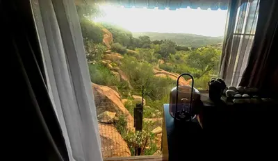 a window with a view of a mountain view at Mathian Farm lifestyle in Tonteldoos