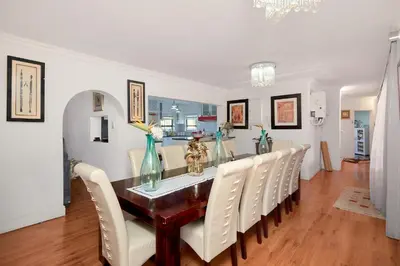 a dining room with a table and chairs at GlenAustin Garden Haven in Midrand