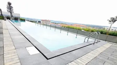 a swimming pool on the roof of a building at Serenity Escape at Ellipse Waterfall in Midrand
