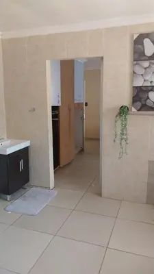 an empty room with a sink and a counter in a building at UrbanStay in Pretoria