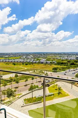 a view of a city from the balcony of a apartment at Ellipse Waterfall Premium Apartments - Blue in Johannesburg