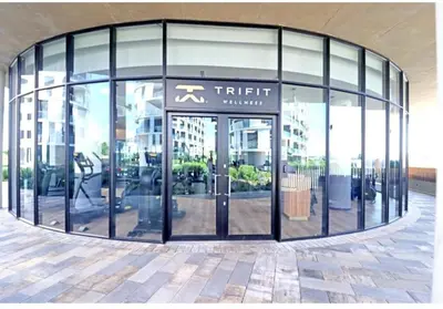 an entrance to a building with a revolving door at Ellipse Waterfall Premium Apartments - Blue in Johannesburg
