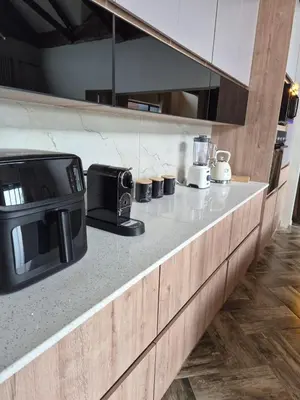 a kitchen with a counter top with a microwave at Highland Gate 948 in Dullstroom