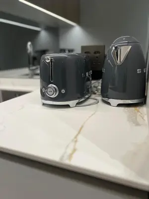 two toasters sitting on top of a counter at Havana at Ellipse Waterfall in Midrand