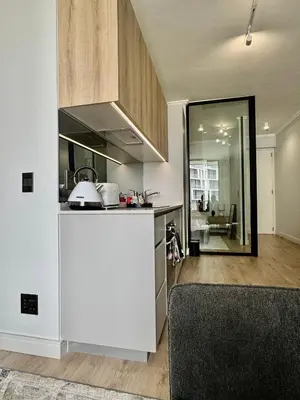 a kitchen with a sink and a counter top at One Palm at Ellipse Waterfall in Midrand