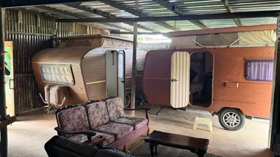 a living room with a couch and an rv at Rocks & Roses SinknBlink in Lochiel