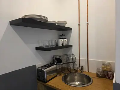 a kitchen counter with a sink and a toaster at Stayfit 04 in Polokwane