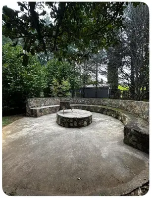 a bench sitting in the middle of a park at Little Lions in Dullstroom
