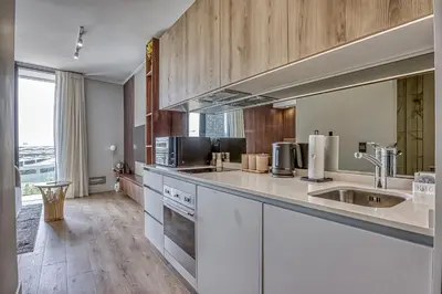 a kitchen with a sink and a counter top at The Oud at Ellipse Waterfall in Vosburg