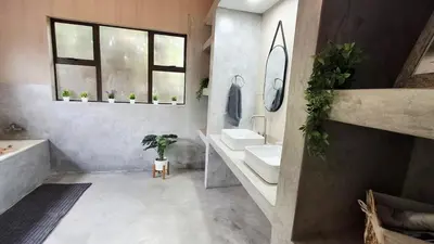 a bathroom with a sink and a tub and a sink at Stille Uitsig Hazyview in Hazyview