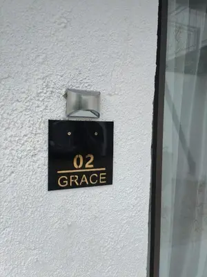 a sign on the side of a building with the word garage at 33 On Driedoring in Kempton Park