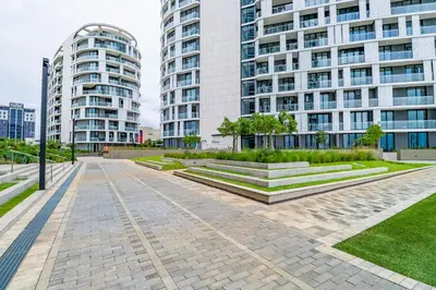 a street in a city with tall buildings at Waterfall Ellipse-4014 Patimo Opulent Apartment in Midrand
