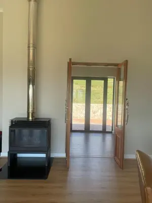 an open door to a room with a glass at Gratia et Pax in Dullstroom