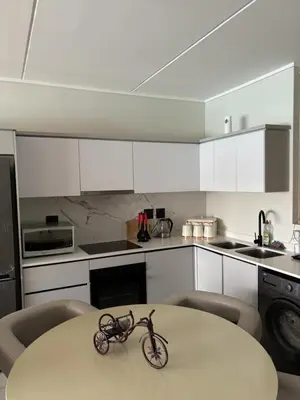 a small bike sitting on a table in a kitchen at The Dream Escape At The Blyde - Lagoon Facing 3 Bedroom Apartment in Pretoria