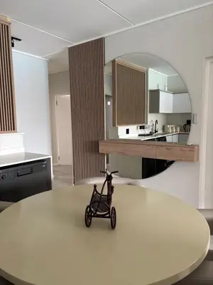 a small cart sitting on top of a table in a kitchen at The Dream Escape At The Blyde - Lagoon Facing 3 Bedroom Apartment in Pretoria