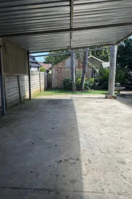 an empty parking lot in a house with a garage at Sky blue in Polokwane