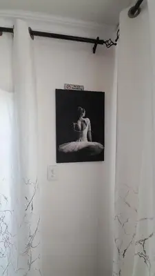 a black and white picture of a woman on a wall at Palma Spaces in Pretoria