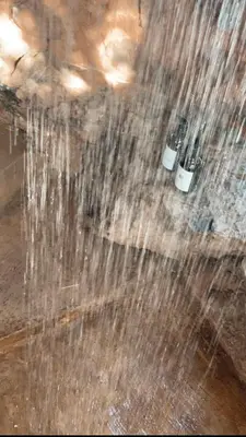a close up of water falling from a ceiling at Aloe Lodge in Thabazimbi
