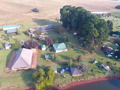 an aerial view of a farm with a group of buildings at Elandskloof Trout Farm in Dullstroom