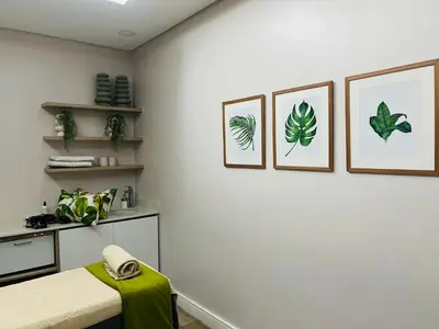 a room with three pictures of plants on the wall at The Blyde Crystal Lagoon Exclusive Apartment in Pretoria