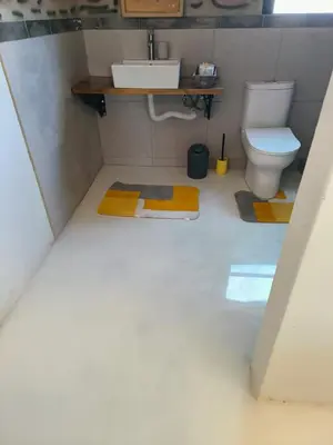 a bathroom with a sink and a toilet at the Host at Bingos House in Thohoyandou