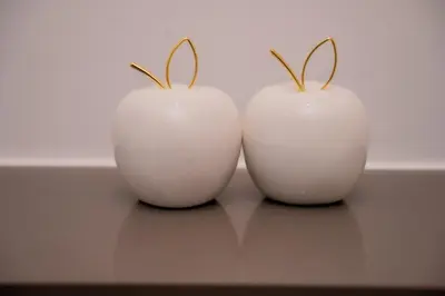 two white objects with rabbits on their heads on a table at 129 at Menlyn Maine in Pretoria