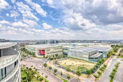 an aerial view of a city with buildings at Ellipse Waterfall Luxe Retreat in Midrand