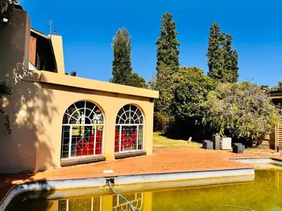 a building with a window on top of it at Bophelong Guest House in Witbank