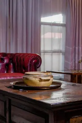 a living room with a table and a couch at Travel Shift Accommodation in Northam