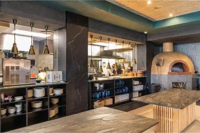a kitchen with a counter and aasteryasteryasteryasteryasteryasteryasteryasteryastery at The Blyde Estate Apartments in Pretoria