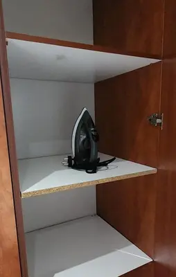 a radio sitting on a shelf in a closet at Elegant Self-Catering Witbank, 6 min Highveld Mall in Witbank