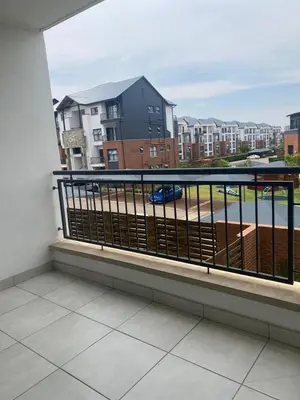 a balcony with a view of a parking lot at The Dream Escape At The Blyde - 2 Bedroom Apartment in Pretoria