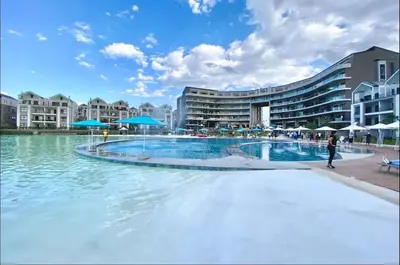 a swimming pool in front of a building at Diamond Suite Munyaka in Midrand